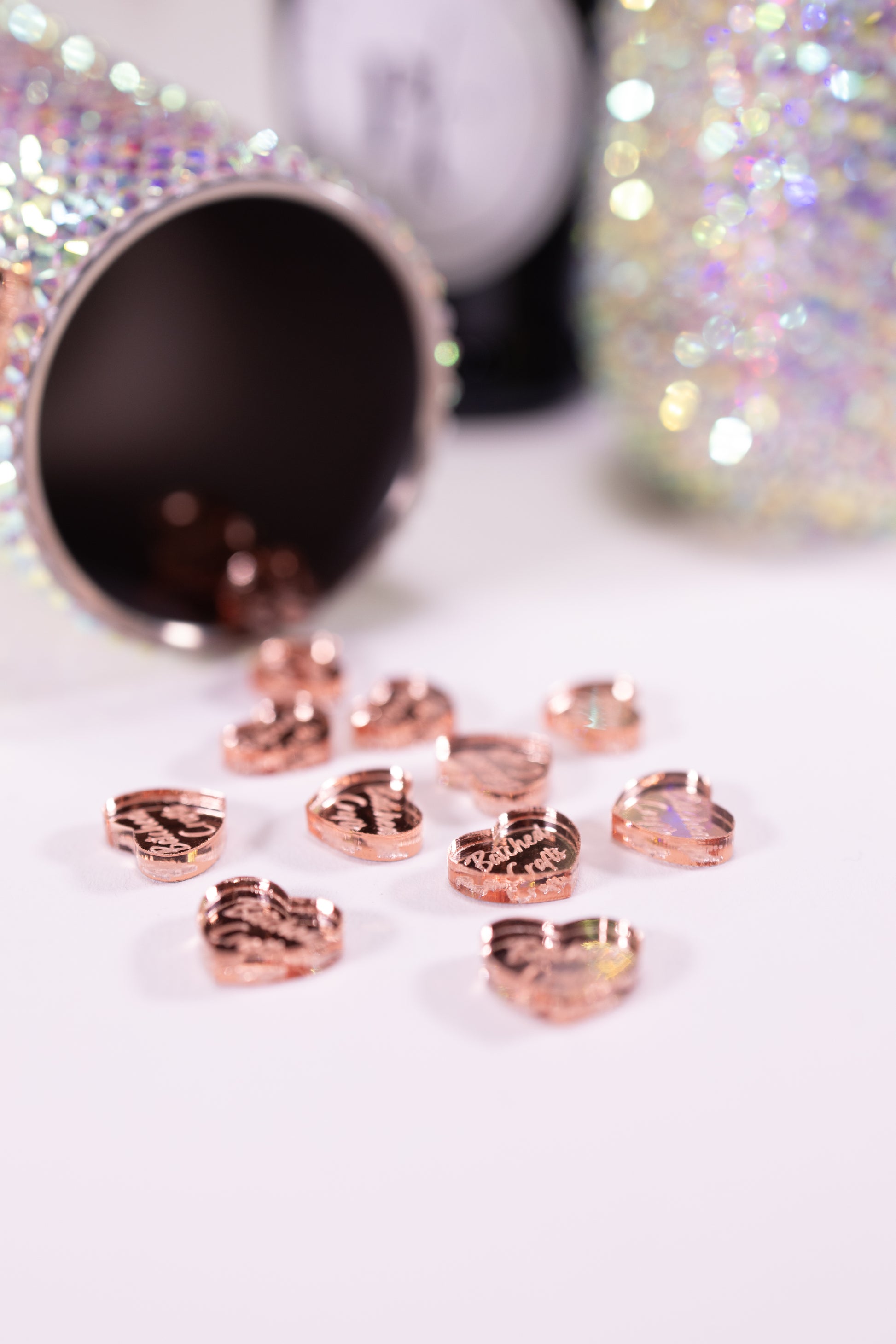 Rose gold hearts spilling out of embellished tumbler